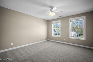 Spacious 5-bedroom, 3.5-bath home in the desirable gated Island on Island West Golf Club in South Carolina - for sale on GolfHomes.com, golf home, golf lot