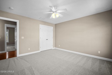 Spacious 5-bedroom, 3.5-bath home in the desirable gated Island on Island West Golf Club in South Carolina - for sale on GolfHomes.com, golf home, golf lot