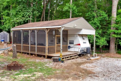Enjoy the perfect blend of comfort and recreation in this 2 bed on River Ridge Golf Club in Virginia - for sale on GolfHomes.com, golf home, golf lot