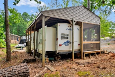 Enjoy the perfect blend of comfort and recreation in this 2 bed on River Ridge Golf Club in Virginia - for sale on GolfHomes.com, golf home, golf lot