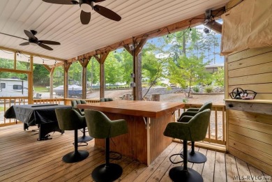 Enjoy the perfect blend of comfort and recreation in this 2 bed on River Ridge Golf Club in Virginia - for sale on GolfHomes.com, golf home, golf lot