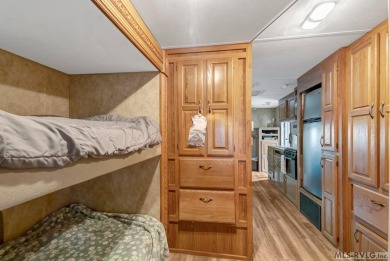 Enjoy the perfect blend of comfort and recreation in this 2 bed on River Ridge Golf Club in Virginia - for sale on GolfHomes.com, golf home, golf lot