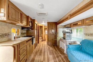 Enjoy the perfect blend of comfort and recreation in this 2 bed on River Ridge Golf Club in Virginia - for sale on GolfHomes.com, golf home, golf lot