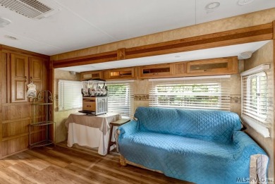 Enjoy the perfect blend of comfort and recreation in this 2 bed on River Ridge Golf Club in Virginia - for sale on GolfHomes.com, golf home, golf lot