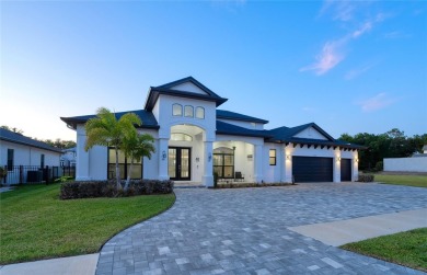 Experience the epitome of luxury living in this stunning smart on Silver Dollar Golf and Trap Club in Florida - for sale on GolfHomes.com, golf home, golf lot