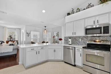 Welcome to this beautifully updated, move-in ready home located on Tampa Bay Golf and Country Club in Florida - for sale on GolfHomes.com, golf home, golf lot