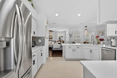 Welcome to this beautifully updated, move-in ready home located on Tampa Bay Golf and Country Club in Florida - for sale on GolfHomes.com, golf home, golf lot