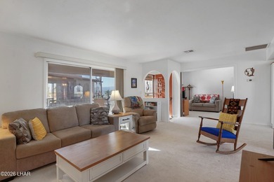 Elevate your lifestyle with sweeping water views and a front-row on London Bridge Golf Course in Arizona - for sale on GolfHomes.com, golf home, golf lot