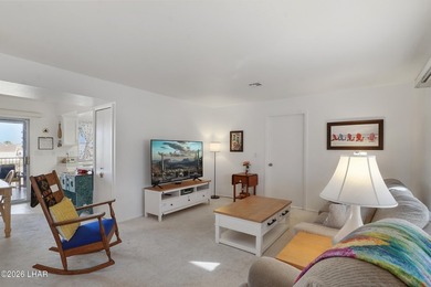 Elevate your lifestyle with sweeping water views and a front-row on London Bridge Golf Course in Arizona - for sale on GolfHomes.com, golf home, golf lot