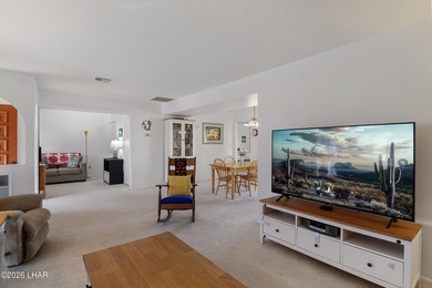 Elevate your lifestyle with sweeping water views and a front-row on London Bridge Golf Course in Arizona - for sale on GolfHomes.com, golf home, golf lot