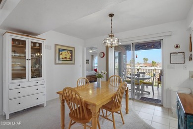 Elevate your lifestyle with sweeping water views and a front-row on London Bridge Golf Course in Arizona - for sale on GolfHomes.com, golf home, golf lot