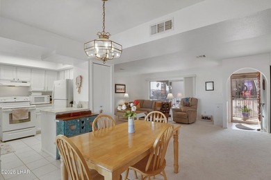 Elevate your lifestyle with sweeping water views and a front-row on London Bridge Golf Course in Arizona - for sale on GolfHomes.com, golf home, golf lot