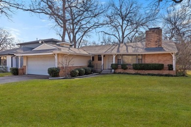 This solid built home sits amongst the huge trees of Kessler on Stevens Park Golf Course in Texas - for sale on GolfHomes.com, golf home, golf lot