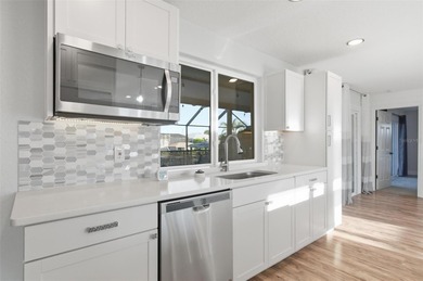 Exquisite Waterfront Oasis - Discover coastal luxury at its on Palm Harbor Golf Club in Florida - for sale on GolfHomes.com, golf home, golf lot