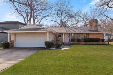 This solid built home sits amongst the huge trees of Kessler on Stevens Park Golf Course in Texas - for sale on GolfHomes.com, golf home, golf lot