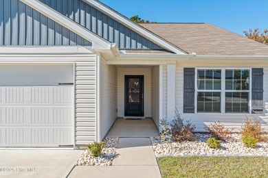 Step into this move-in ready 3 bedroom, 2 bath home built in on Lennon Hills Golf Course in North Carolina - for sale on GolfHomes.com, golf home, golf lot