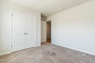 Step into this move-in ready 3 bedroom, 2 bath home built in on Lennon Hills Golf Course in North Carolina - for sale on GolfHomes.com, golf home, golf lot