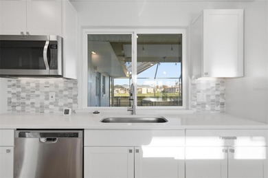 Exquisite Waterfront Oasis - Discover coastal luxury at its on Palm Harbor Golf Club in Florida - for sale on GolfHomes.com, golf home, golf lot