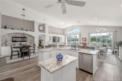 Ballantrae Pool Home with NEW ROOF, custom kitchen, new flooring on Santa Lucia River Club in Florida - for sale on GolfHomes.com, golf home, golf lot