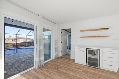 Exquisite Waterfront Oasis - Discover coastal luxury at its on Palm Harbor Golf Club in Florida - for sale on GolfHomes.com, golf home, golf lot