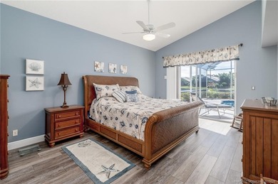 Ballantrae Pool Home with NEW ROOF, custom kitchen, new flooring on Santa Lucia River Club in Florida - for sale on GolfHomes.com, golf home, golf lot