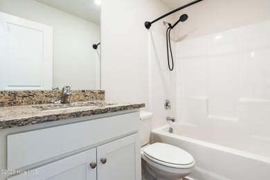 Step into this move-in ready 3 bedroom, 2 bath home built in on Lennon Hills Golf Course in North Carolina - for sale on GolfHomes.com, golf home, golf lot