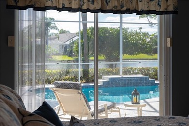 Ballantrae Pool Home with NEW ROOF, custom kitchen, new flooring on Santa Lucia River Club in Florida - for sale on GolfHomes.com, golf home, golf lot