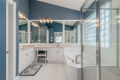 Ballantrae Pool Home with NEW ROOF, custom kitchen, new flooring on Santa Lucia River Club in Florida - for sale on GolfHomes.com, golf home, golf lot