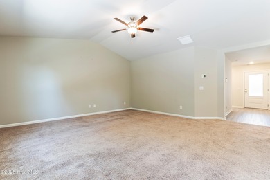 Step into this move-in ready 3 bedroom, 2 bath home built in on Lennon Hills Golf Course in North Carolina - for sale on GolfHomes.com, golf home, golf lot