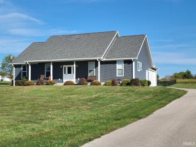 This 3-bedroom, 2-bath home on 1 acre sits across from Rolling on Rolling Meadows Golf Course in Indiana - for sale on GolfHomes.com, golf home, golf lot