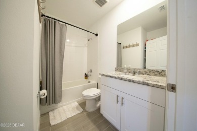 WATERFRONT HOME - PRICED TO SELL! Stunning, energy-efficient on LPGA International Golf Course in Florida - for sale on GolfHomes.com, golf home, golf lot