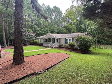 I am pleased to present an exceptional property located directly on South Hill Country Club in Virginia - for sale on GolfHomes.com, golf home, golf lot