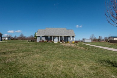 This 3-bedroom, 2-bath home on 1 acre sits across from Rolling on Rolling Meadows Golf Course in Indiana - for sale on GolfHomes.com, golf home, golf lot