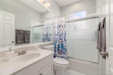 Ballantrae Pool Home with NEW ROOF, custom kitchen, new flooring on Santa Lucia River Club in Florida - for sale on GolfHomes.com, golf home, golf lot