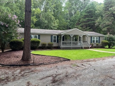 I am pleased to present an exceptional property located directly on South Hill Country Club in Virginia - for sale on GolfHomes.com, golf home, golf lot