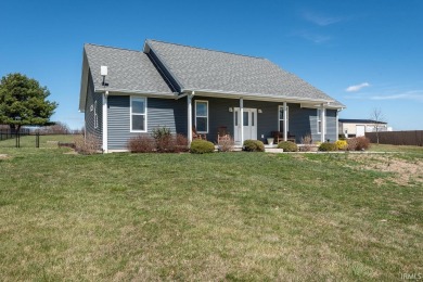 This 3-bedroom, 2-bath home on 1 acre sits across from Rolling on Rolling Meadows Golf Course in Indiana - for sale on GolfHomes.com, golf home, golf lot