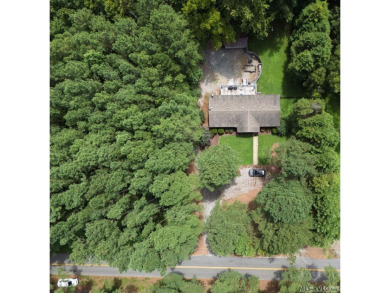 I am pleased to present an exceptional property located directly on South Hill Country Club in Virginia - for sale on GolfHomes.com, golf home, golf lot