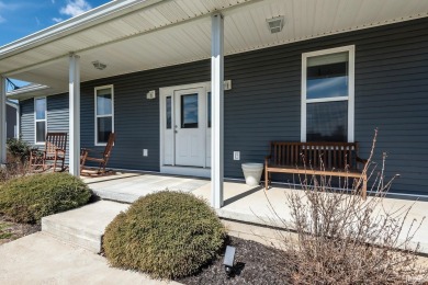 This 3-bedroom, 2-bath home on 1 acre sits across from Rolling on Rolling Meadows Golf Course in Indiana - for sale on GolfHomes.com, golf home, golf lot