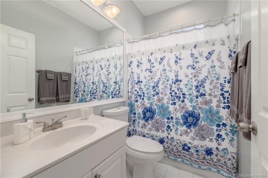 Ballantrae Pool Home with NEW ROOF, custom kitchen, new flooring on Santa Lucia River Club in Florida - for sale on GolfHomes.com, golf home, golf lot