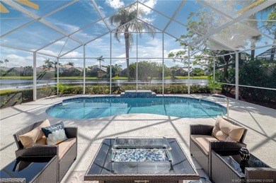 Ballantrae Pool Home with NEW ROOF, custom kitchen, new flooring on Santa Lucia River Club in Florida - for sale on GolfHomes.com, golf home, golf lot