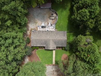 I am pleased to present an exceptional property located directly on South Hill Country Club in Virginia - for sale on GolfHomes.com, golf home, golf lot