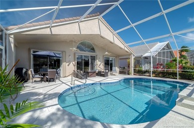 Ballantrae Pool Home with NEW ROOF, custom kitchen, new flooring on Santa Lucia River Club in Florida - for sale on GolfHomes.com, golf home, golf lot