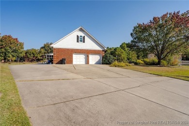 An exquisite home located in the Baywood Golf Community with 3 on Baywood Golf Club in North Carolina - for sale on GolfHomes.com, golf home, golf lot