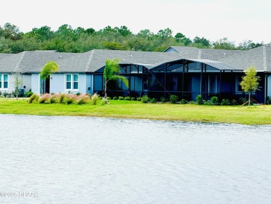 WATERFRONT HOME - PRICED TO SELL! Stunning, energy-efficient on LPGA International Golf Course in Florida - for sale on GolfHomes.com, golf home, golf lot