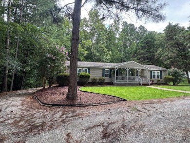 I am pleased to present an exceptional property located directly on South Hill Country Club in Virginia - for sale on GolfHomes.com, golf home, golf lot
