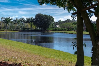 Ballantrae Pool Home with NEW ROOF, custom kitchen, new flooring on Santa Lucia River Club in Florida - for sale on GolfHomes.com, golf home, golf lot