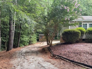 I am pleased to present an exceptional property located directly on South Hill Country Club in Virginia - for sale on GolfHomes.com, golf home, golf lot