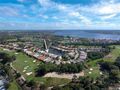 Ballantrae Pool Home with NEW ROOF, custom kitchen, new flooring on Santa Lucia River Club in Florida - for sale on GolfHomes.com, golf home, golf lot