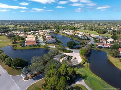 Ballantrae Pool Home with NEW ROOF, custom kitchen, new flooring on Santa Lucia River Club in Florida - for sale on GolfHomes.com, golf home, golf lot