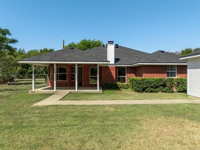 Welcome home to this beautifully maintained brick residence on White Bluff Resort - New Course in Texas - for sale on GolfHomes.com, golf home, golf lot